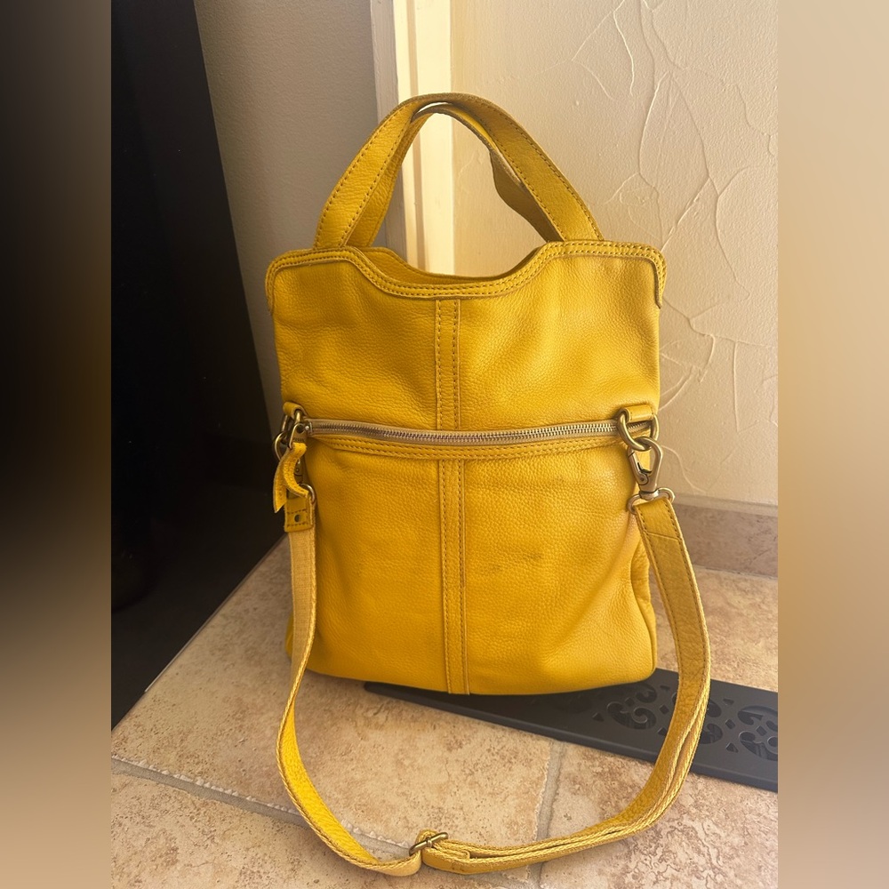 Fossil leather bag.